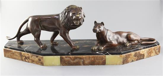 A French Art Deco group of a lion and lioness, width 30in.